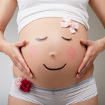 Pregnant belly look like a smiling face
